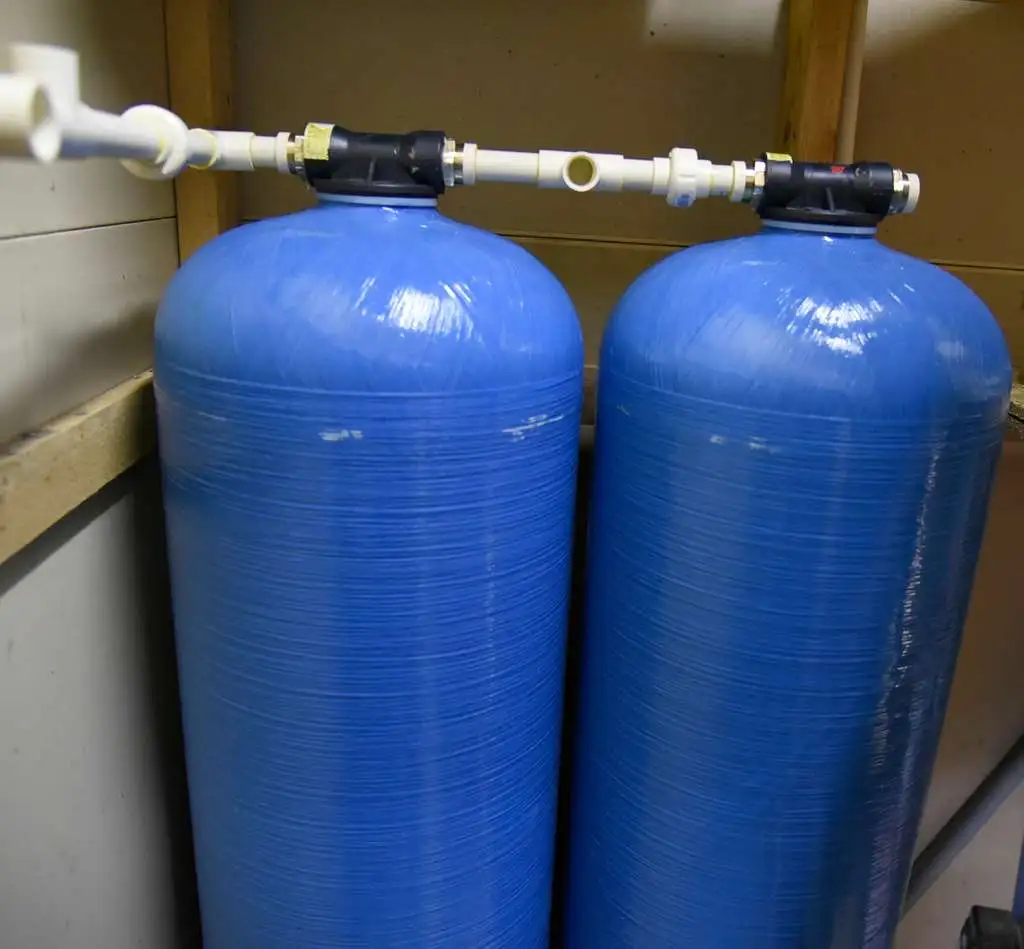 a contractor installs a whole house water filtration 267ad1 1024 1